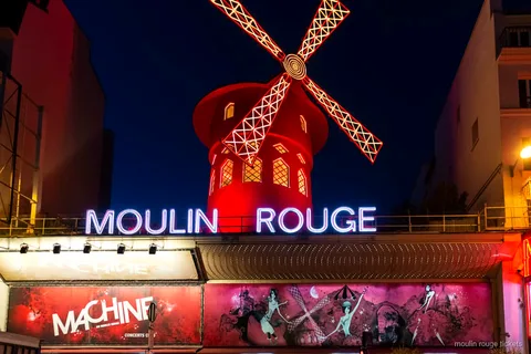 Moulin Rouge dinner show tickets with champagne and return transport in Paris